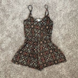 Flowy black colourful romper. Spaghetti straps